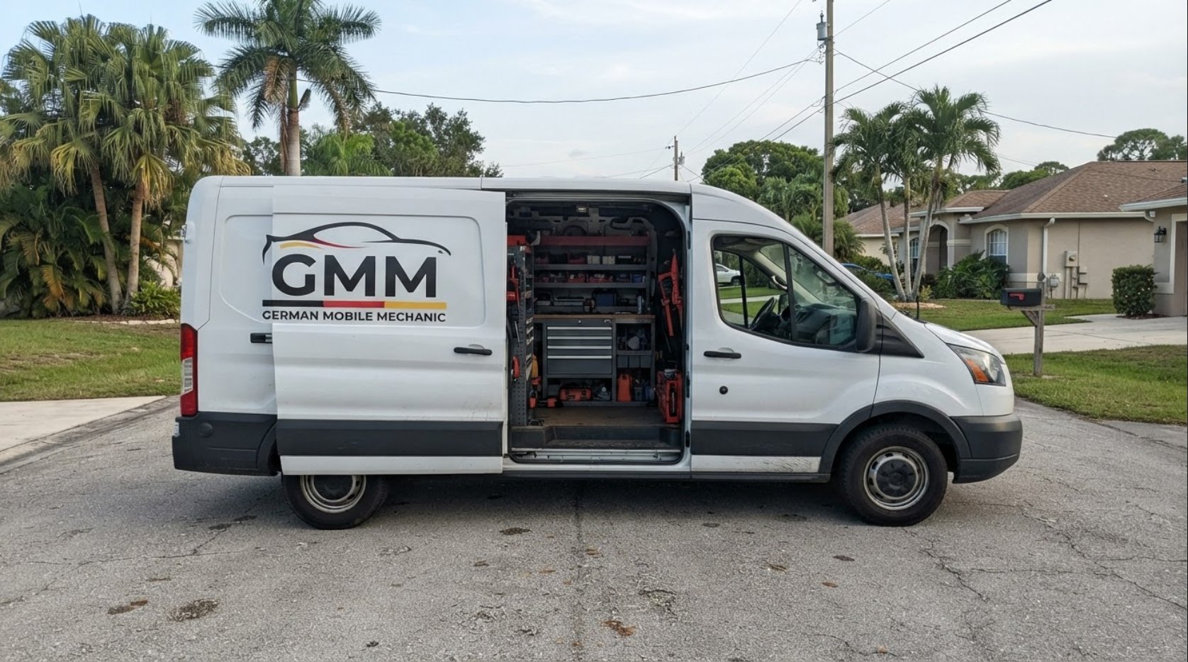 German Mobile Mechanic service van parked on a residential street